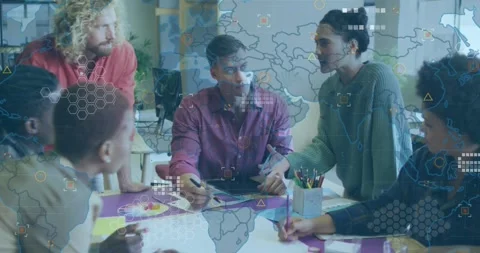 Animation of world map against diverse colleagues discussing over a documents at Stock Footage 328934578