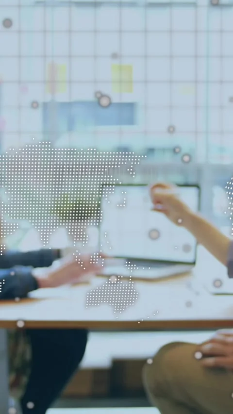 Animation of world map and data processing over business people working in Stock Footage 321719556
