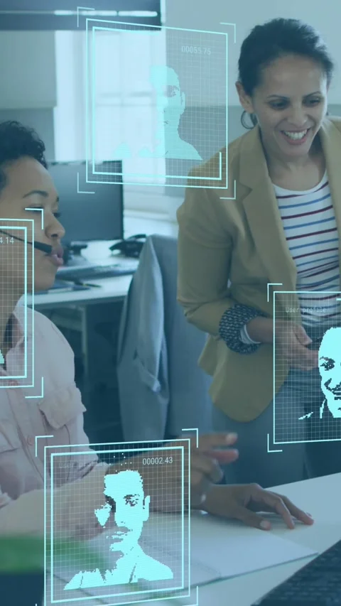 Animation of world map and icons over diverse female coworkers working in office Stock Footage 342915134