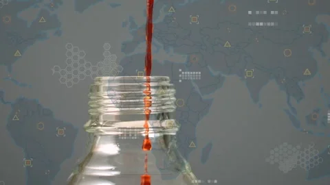 Animation of world map with data processing over beaker with liquid Stock Footage 325962591