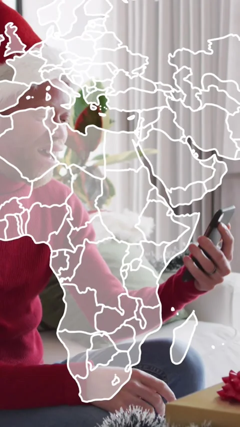 Animation of world map over albino african american man at christmas Stock Footage 341991467