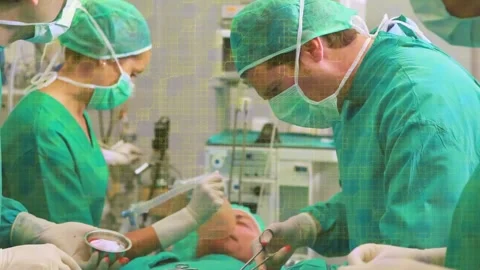 Animation of yellow grid processing data over diverse group of surgeons Stock Footage 329967588