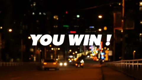 Animation of you win text over out of focus city background Stock Footage 246733075
