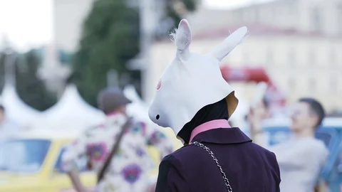 An animator with a rabbit mask on his head Stock Footage 126568813