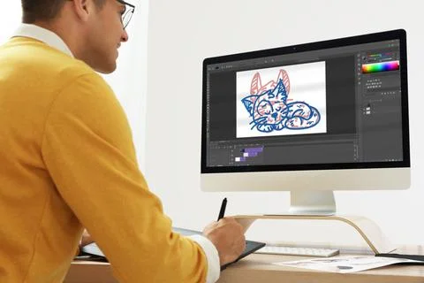 Animator working with graphic tablet and computer. Illustration on screen Stock Photos