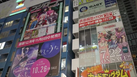 Anime billboards on Japanese building Stock Footage