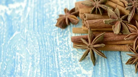 Anise and cinnamon, blue background Stock Footage 47009582