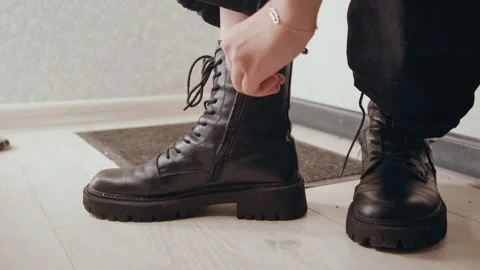 Ankle and sole features of leather boots captured in closeup. Detailed Stock Footage 342335120