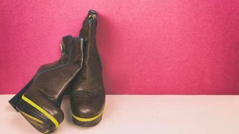 Ankle boots on a colored background. Stock-Fotos