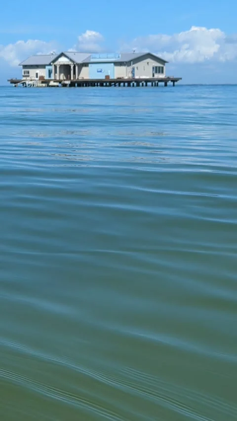 Anna Maria Island pier stranded in the sea after storm 2024 Stock Footage 293229668