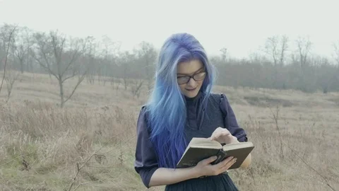 Anna reading a book Stock Footage 83264073