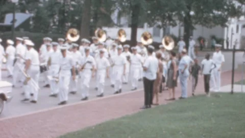 Annapolis - 1963: cadets march in the streets, people watch from sidewalk Stock Footage 258324568