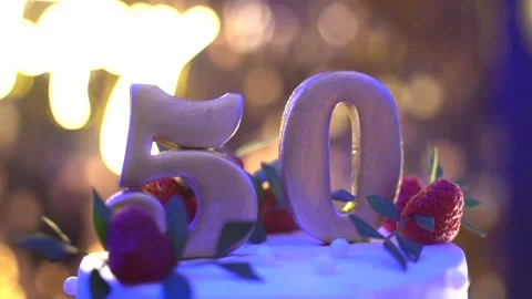 Anniversary numbers 50 on a cake 스톡 동영상 246524863