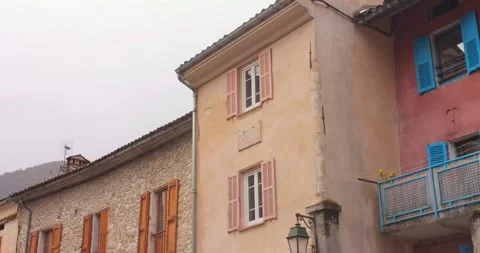 Annot old town as authentic French village with ancient and pastel colored Vidéo 332602750