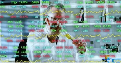 Annotating financial data on glass board in office, with red marker, eyeglasses, Stock Photos