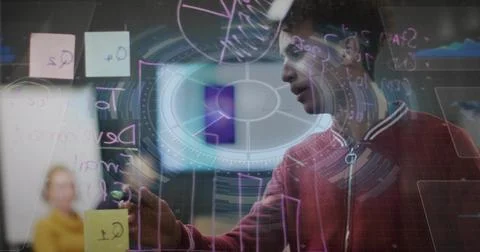 Annotating man in red sweater using marker on partition in conference room wi Stock Photos