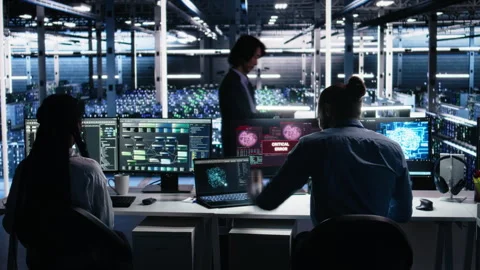 Annoyed data center programmer struggles with malfunctions gear while using AI Stock-Footage 313569614
