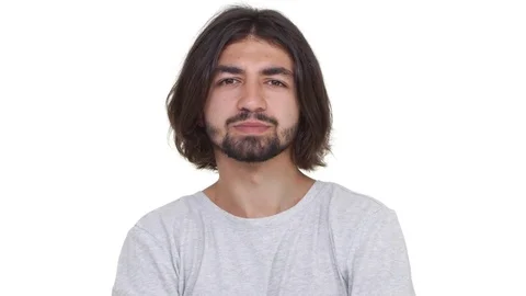 Annoyed guy sighing heavily isolated over white background in slowmotion Stock Footage