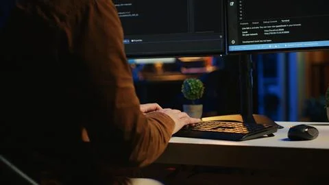 Annoyed IT admin having difficulties with damaged computer peripheral, close up 库存照片