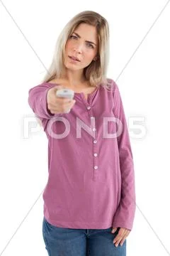 Annoyed woman changing channel Stock Photos