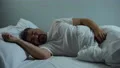 Annoying mosquitoes disturbing man in bed needs insect repellent and window nets 4k or 4k+ Resolution