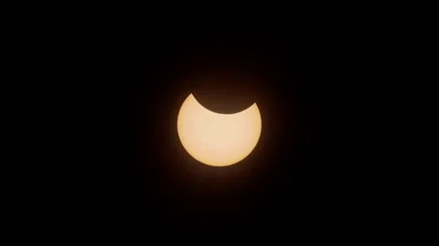 An annular eclipse of the sun from October 2023. The moon covers the sun Stock Footage 256779125