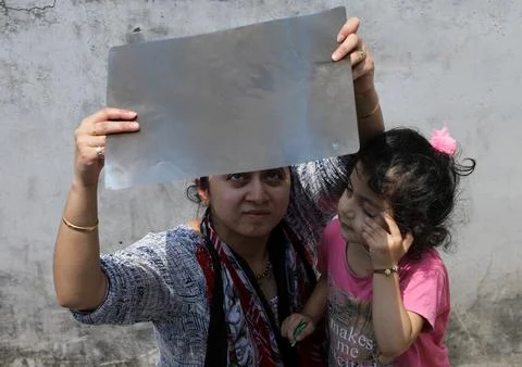 Annular partial solar eclipse making 'ring of fire' effect seen from northern In Stock Photos