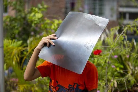 Annular partial solar eclipse seen from Dhaka Sky, Bangladesh - 21 Jun 2020 Stock Photos