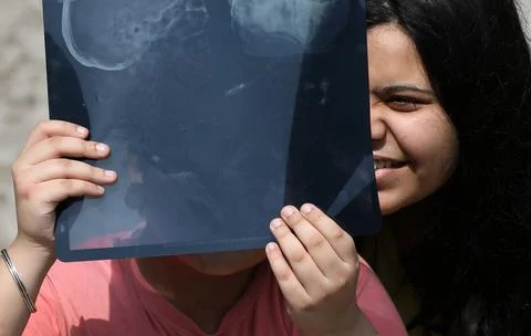 Annular solar eclipse making 'ring of fire' effect seen from northern India, Jam Stock Photos