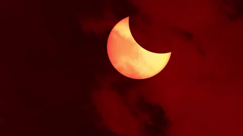 Annular solar eclipse nearing its totality as seen - solar eclipse, art video Stock Footage 136926938