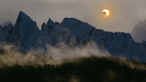Annular Solar Eclipse over The Forbidden Peaks 4K Stock Footage 118991374
