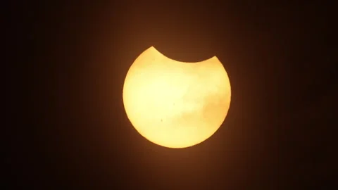 Annular Solar Eclipse taking place looking up at the Sun and Moon Stock Footage 253298858