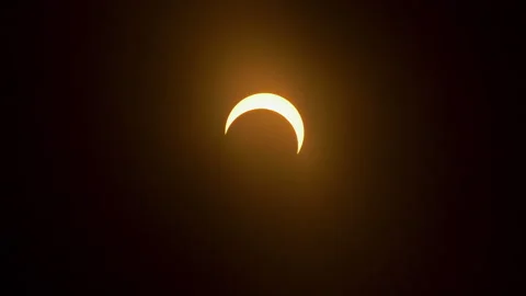 Annular Solar Eclipse timelapse after totality, the sun and moon move away Stock Footage 253370926