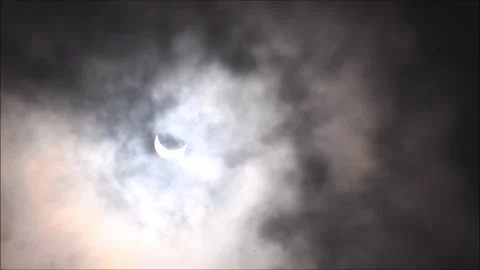 Annular Solar Eclipse visible amidst clouds in Guwahati, Assam, India Stock Footage 170338078