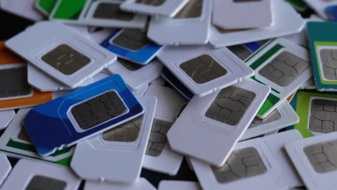 Anonimous sim cards multicolored rotating C0010 Stock Footage 254892321