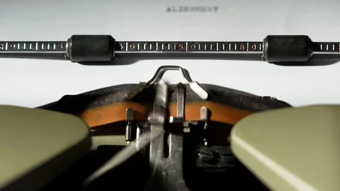 ANONYMOUS and ALIGNMENT written on old green vintage retro typewriter finance Stock Footage 125149104