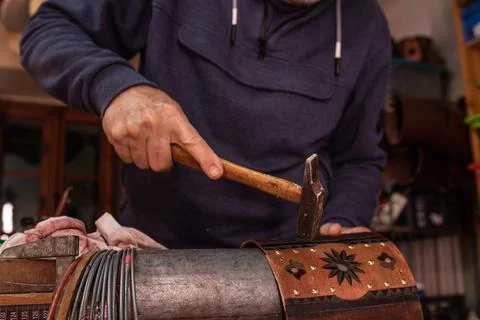 Anonymous artisan making drum shell in workshop 写真素材