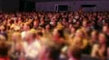 The anonymous audience applauded after the premiere. HD Footage