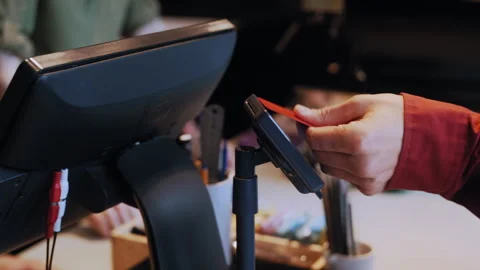 Anonymous Barista Handles Payment While Coffee Is Served Stock Footage 307587631