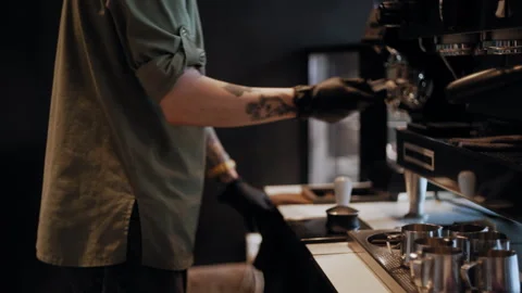Anonymous Barista Prepares Coffee Machine After Putting on Gloves Video stock 307596876