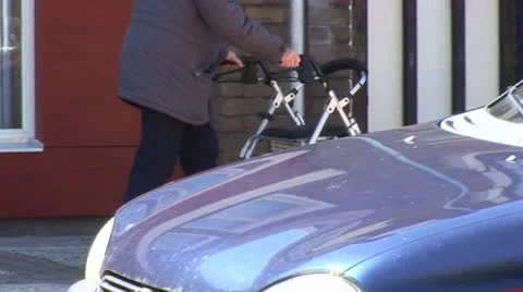 Anonymous behind walker Stock Footage 25134143