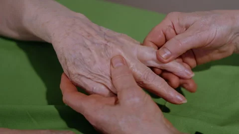 Anonymous Close-Up of Senior Client Receiving Finger Massage Video stock 311380075