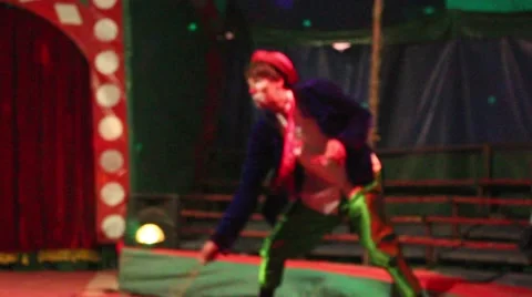 Anonymous clown jumps and having fun in the circus 2 Stock Footage 44443523