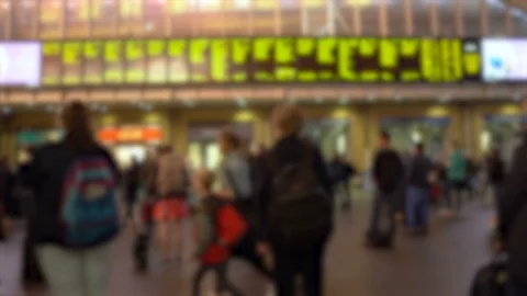 Anonymous Commuters Looking At Departure Board in Busy Railway Station Stock Footage 112126209