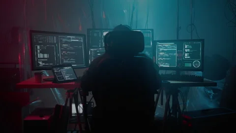 Anonymous computer cracker preparing cyber attack at night Stock-Footage 257380915