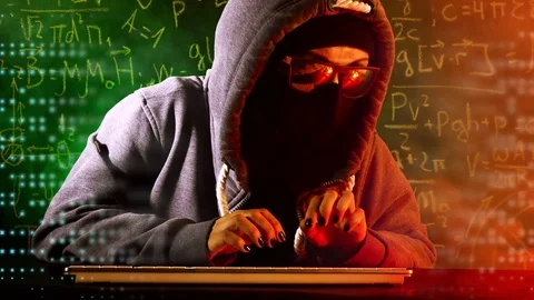 Anonymous computer hacker with mathematical formulas on background Stock Footage 128853651