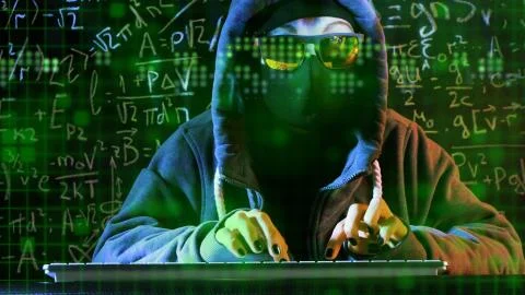 Anonymous computer hacker with mathematical formulas on background.  Stock Photos