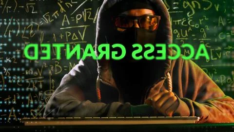 Anonymous computer hacker with mathematical formulas on background.  스톡 사진