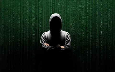 Anonymous computer hacker over abstract digital background. Obscured dark face 库存照片