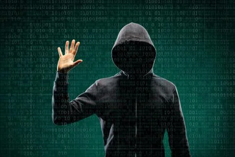 Anonymous computer hacker over abstract digital background. Obscured dark face Stock-Fotos